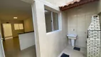 Foto 2 de Casa de Condomínio com 2 Quartos à venda, 49m² em Mirim, Praia Grande