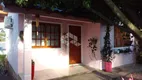 Foto 3 de Casa com 2 Quartos à venda, 57m² em Auxiliadora, Gravataí