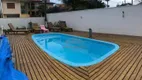 Foto 2 de Casa com 4 Quartos à venda, 220m² em Praia do Meio - Ens Brito, Palhoça