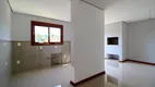 Foto 6 de Casa com 3 Quartos à venda, 240m² em Vila Nova, Porto Alegre