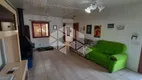 Foto 2 de Casa com 2 Quartos à venda, 107m² em Vila Nova, Porto Alegre