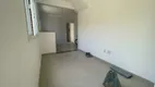 Foto 4 de Casa com 2 Quartos à venda, 65m² em Areia Branca, Santos