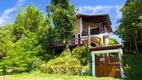 Foto 3 de Casa de Condomínio com 4 Quartos à venda, 260m² em Cocanha, Caraguatatuba