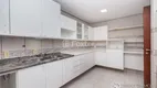 Foto 9 de Casa de Condomínio com 4 Quartos à venda, 272m² em Boa Vista, Porto Alegre