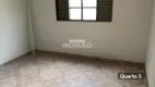 Foto 10 de Casa com 4 Quartos à venda, 130m² em Jardim das Palmeiras, Uberlândia