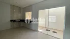 Foto 4 de Casa com 3 Quartos à venda, 100m² em Segismundo Pereira, Uberlândia