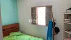 Foto 8 de Casa com 6 Quartos à venda, 210m² em Santa Mônica, Uberlândia