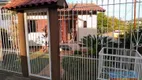 Foto 2 de Casa com 4 Quartos à venda, 100m² em Vila Nova, Porto Alegre