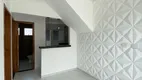 Foto 2 de Casa de Condomínio com 2 Quartos à venda, 41m² em Balneario Japura, Praia Grande