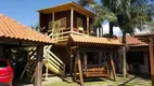 Foto 2 de Sobrado com 4 Quartos à venda, 129m² em Araca, Capão da Canoa