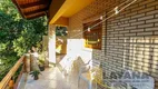 Foto 2 de Casa com 5 Quartos à venda, 234m² em Cavalhada, Porto Alegre