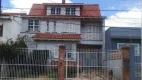 Foto 3 de Casa com 4 Quartos à venda, 258m² em Santa Fé, Porto Alegre