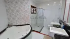 Foto 16 de Casa de Condomínio com 4 Quartos à venda, 384m² em Castelandia, Serra