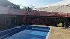 Foto 15 de Casa com 5 Quartos para alugar, 345m² em Massaguaçu, Caraguatatuba