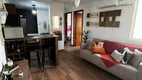 Foto 2 de Apartamento com 2 Quartos à venda, 39m² em Vila Nova, Porto Alegre
