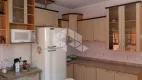 Foto 5 de Casa com 3 Quartos à venda, 178m² em Santa Fé, Porto Alegre