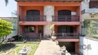 Foto 4 de Casa com 6 Quartos à venda, 571m² em Cavalhada, Porto Alegre