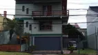 Foto 2 de Sobrado com 3 Quartos à venda, 310m² em Tarumã, Viamão