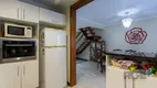 Foto 15 de Casa com 5 Quartos à venda, 299m² em Guarujá, Porto Alegre