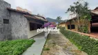 Foto 2 de Casa com 4 Quartos à venda, 230m² em Martim de Sa, Caraguatatuba