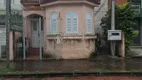 Foto 2 de Casa com 4 Quartos à venda, 224m² em Rio Branco, Porto Alegre