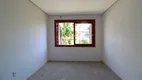 Foto 18 de Casa com 3 Quartos à venda, 240m² em Vila Nova, Porto Alegre