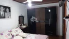 Foto 6 de Casa com 3 Quartos à venda, 250m² em Santa Fé, Porto Alegre