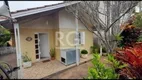 Foto 2 de Casa com 3 Quartos à venda, 144m² em Vila Nova, Porto Alegre