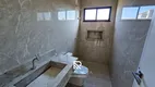 Foto 8 de Casa de Condomínio com 4 Quartos à venda, 258m² em Cidade Alpha, Eusébio