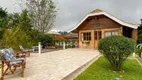 Foto 4 de Casa com 4 Quartos à venda, 257m² em Vila Nova Suica, Campos do Jordão