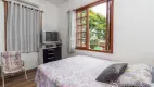 Foto 14 de Casa com 4 Quartos à venda, 121m² em Medianeira, Porto Alegre