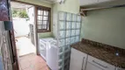 Foto 10 de Casa com 4 Quartos à venda, 237m² em Ipanema, Porto Alegre