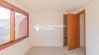 Foto 10 de Casa de Condomínio com 3 Quartos à venda, 170m² em Vila Nova, Porto Alegre