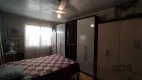 Foto 11 de Casa com 2 Quartos à venda, 81m² em Vila Nova, Porto Alegre