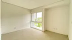 Foto 18 de Casa de Condomínio com 4 Quartos à venda, 270m² em Vila Nova, Porto Alegre