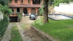 Foto 2 de Casa com 4 Quartos à venda, 279m² em Vila Nova, Porto Alegre