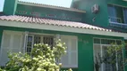 Foto 2 de Casa com 4 Quartos à venda, 252m² em Espiríto Santo, Porto Alegre