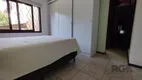 Foto 11 de Casa com 5 Quartos à venda, 235m² em Vila Nova, Porto Alegre