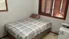 Foto 10 de Casa com 2 Quartos à venda, 104m² em Vila Nova, Porto Alegre