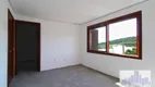 Foto 9 de Casa de Condomínio com 3 Quartos à venda, 225m² em Vila Nova, Porto Alegre