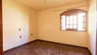 Foto 28 de Casa com 4 Quartos para alugar, 302m² em Restinga, Porto Alegre