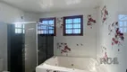 Foto 14 de Sobrado com 4 Quartos à venda, 178m² em Krahe, Viamão