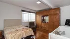 Foto 4 de Casa com 4 Quartos à venda, 266m² em Santa Fé, Porto Alegre