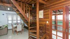 Foto 12 de Casa com 4 Quartos à venda, 226m² em Vila Nova, Porto Alegre