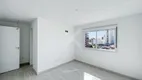 Foto 11 de Apartamento com 2 Quartos à venda, 78m² em Passo da Areia, Porto Alegre