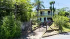 Foto 2 de Casa com 5 Quartos à venda, 250m² em Vila Nova, Porto Alegre