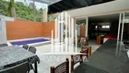 Foto 10 de Casa de Condomínio com 4 Quartos à venda, 315m² em Jardim Três Marias, Guarujá