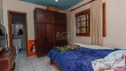 Foto 12 de Casa com 5 Quartos à venda, 350m² em Vila Nova, Porto Alegre