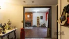 Foto 6 de Casa com 6 Quartos à venda, 572m² em Cavalhada, Porto Alegre