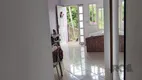 Foto 18 de Casa com 4 Quartos à venda, 69m² em Tarumã, Viamão